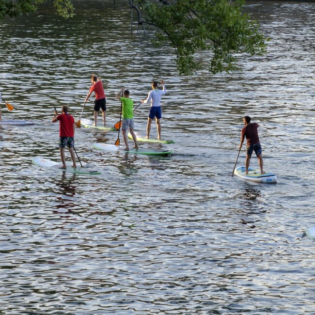 STAND-UP PADDLEBOARDING (SUP) -

Glide on the water and discover the joy of paddleboarding.